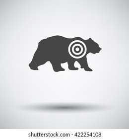 Bear silhouette with target  icon on gray background with round shadow. Vector illustration.