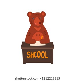 Bear sitting at the desk, cute animal cartoon character at school, education and knowledge concept vector Illustration on a white background