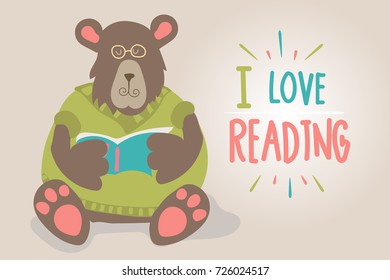 bear in a sweater reading a book. I love to read.