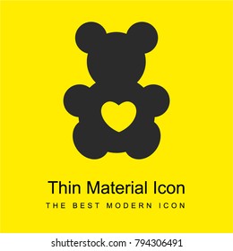 Bear toy silhouette with a heart shape bright yellow material minimal icon or logo design