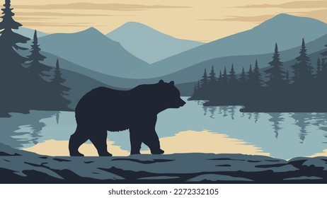 Un oso camina junto a un lago con bosques y montañas