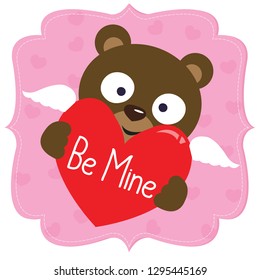 Bear with wings holding a heart