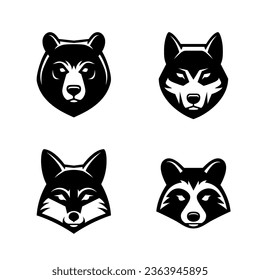 Bear, wolf, fox and raccoon face icon or logo set. Wild animals head symbols.