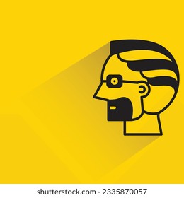 beard man with shadow on yellow background