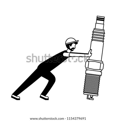 beard mechanic pushing spark plug automotive part