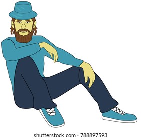 a bearded man in a hat sitting