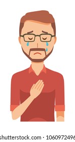 A bearded man wearing eyeglasses is crying
