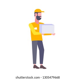 bearded postman man holding cardboard box man courier in uniform carrying parcel express delivery concept male cartoon character full length flat isolated