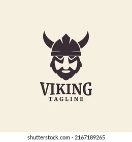 bearded viking warrior head logo with horned helmet vector icon symbol illustration design