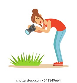 Beatuful woman taking picture of green grass with her camera. Colorful character vector Illustration
