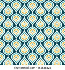 Beautiful abstract seamless pattern. Blue and yellow ornament for fashion textile, cloth, texture. Vector ornament. Kaleidoscope big bud. Islam, Arabic, Indian, ottoman motifs. Retro print. Vintage. 