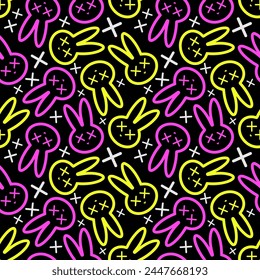 Beautiful abstract and stylish modern yellow and pink silhouettes of rabbit head with crosses and nose isolated on black background seamless dynamic pattern for gift wrapping, textile, print texture