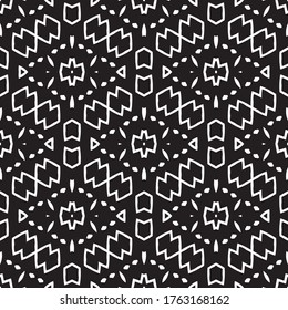 Beautiful abstract tribal  inspired geometric vector pattern background. Great  for scrap booking, stationary,packaging,  textile and home decor projects.