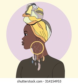 Beautiful African American colorful woman with turban and dream catcher earring. Vector.Isolated