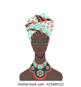 Beautiful African woman in traditional turban and colorful necklace