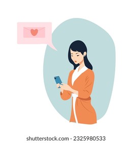 beautiful Asian woman receives a text message