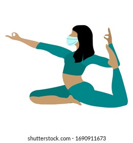Beautiful athletic girl in a mask does yoga at home. KOVID-19 prevention.Social distance in the coronavirus pandemic. Stay home, stay safe concept. Yoga pose, meditation and healthy lifestyle.