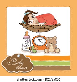Beautiful baby girl on on weighing scale