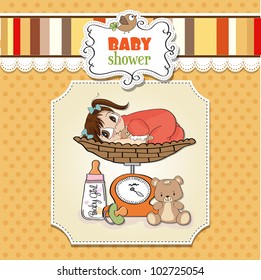 Beautiful baby girl on on weighing scale