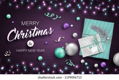 Beautiful background with Christmas decoration. Vector illustration of happy new year 2019 with blue and silver Christmas balls, gifts, garlands and ribbons on purple backdrop. Holiday greeting card