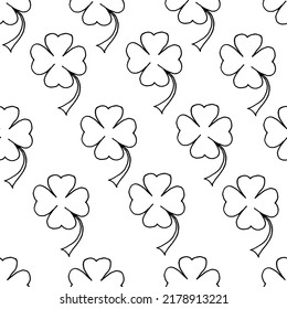 Beautiful background of clover drawn with a black marker on white paper. Seamless nature pattern. Print for bed linen. Saint Patrick's day concept. St. Patrick's background. 