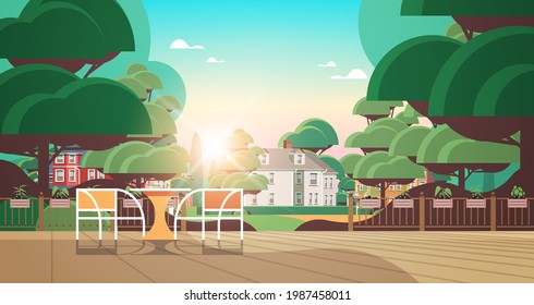 beautiful backyard terrace with chairs and table sunset cityscape background horizontal