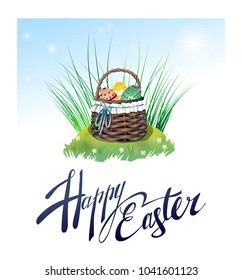 Beautiful basket with Easter eggs on the grass.