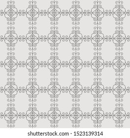 Beautiful batik ethnic seamless pattern, gray and dark neutral, stylish, for backgrounds, carpets, wallpapers, clothing, wrappers, fabrics, classic and vintage vector illustrations. floral, abstract.