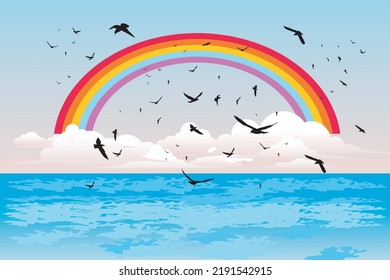 Beautiful beach. Colorful rainbow. Natural scenery with rainbow background