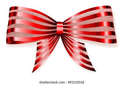Beautiful big bow made of striped red shiny ribbon with shadow