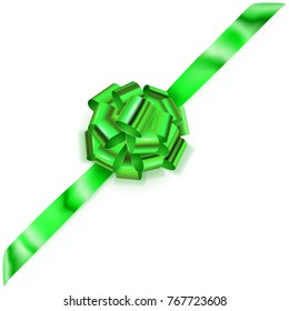 Beautiful big corner bow made of green shiny ribbon with shadow on white background
