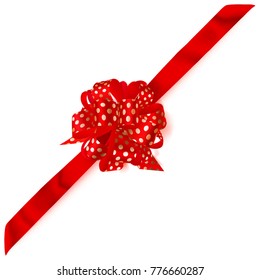 Beautiful big corner bow made of red ribbon in polka dots with shadow on white background