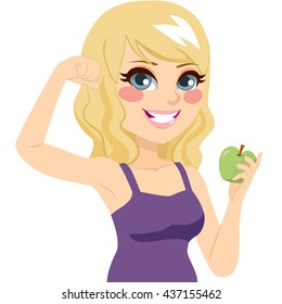 Beautiful blonde young teenager girl with green apple and arm up showing strong biceps