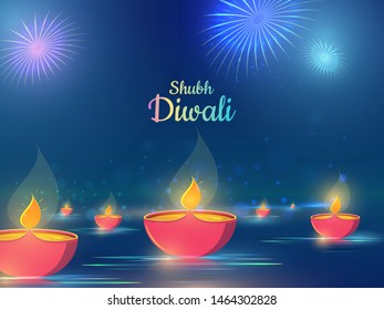 Hermosa explosión de fuegos artificiales azules vista el fondo con lámpara de aceite iluminada para el concepto de celebración del festival Subh Diwali para uso como afiche o diseño de pancartas.