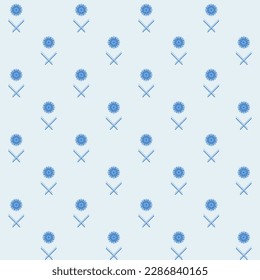 Beautiful blue flowers on light blue background. It is a seamless pattern that looks pretty and chic.