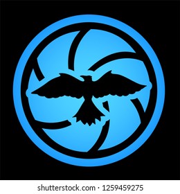 Beautiful blue insignia with bird in the center of shutter on black background