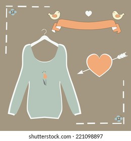 Beautiful blue jacket hanging on a hanger, with birds, hearts and arrows and signs flowers 