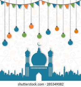 Beautiful blue mosque with colorful hanging lights and bunting decoration on artistic floral pattern background for Islamic holy month of prayers, Ramadan Kareem celebration. 