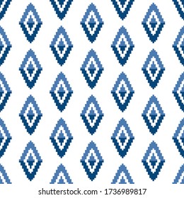 Beautiful blue pixel rhombuses isolated on white background. Geometric seamless pattern. Vector graphic illustration. Texture.