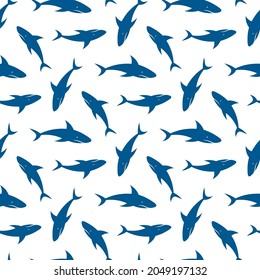 Beautiful blue shark isolated on white background. Cute monochrome seamless pattern. Vector simple flat graphic illustration. Texture.