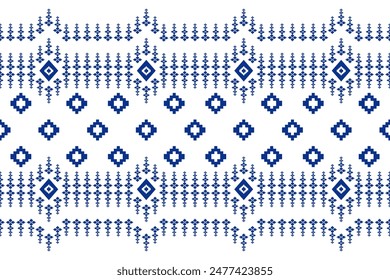 Beautiful blue vintage cross stitch traditional ethnic pattern.floral pixel art embroidery. Elegance background abstract Aztec seamless pattern for fabric,cloth,dress,carpet,border,sarong,batik.