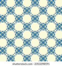 A beautiful blue and white flower pattern on a creme background