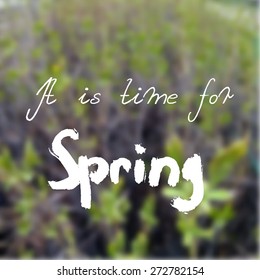Beautiful blurred background with text and spring branches.