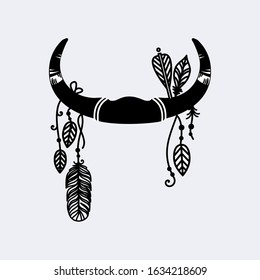 Beautiful boho horns with hanging leaves and feathers vector illustration