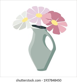 beautiful bouquet of wildflowers in a blue vase on a green background.