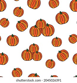 A Beautiful bright orange pumpkins for holiday halloween isolated on a white background. Seamless pattern