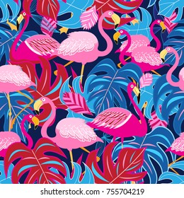 Beautiful bright tropical pattern of pink flamingos and leaves on a blue background