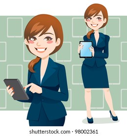 Beautiful brunette business woman using a touch pad tablet portable computer