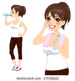 Beautiful brunette holding a bottle of water and drinking after sport exercise