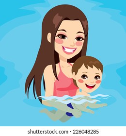 Beautiful brunette mom at swimming pool teaching her baby boy how to swim